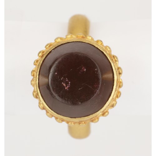 An Early and Rare Byzantine Finger-Ring with High Calyx-Shaped Bezel set with Flat-Topped Conical Garnet